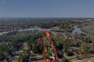 This exceptional waterfront home features 4 bedrooms and 4 on Cypress Country Club and Golf Club  in Alabama - for sale on GolfHomes.com, golf home, golf lot