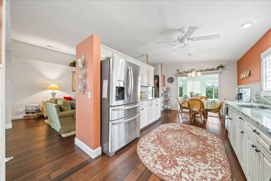 Morning coffee or evening cocktails on the enclosed lanai on Spanish Lakes Fairways in Florida - for sale on GolfHomes.com, golf home, golf lot