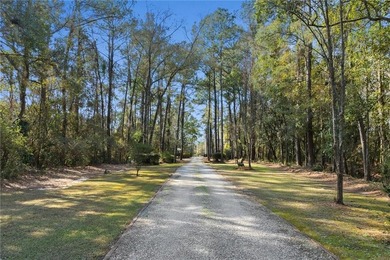This exceptional waterfront home features 4 bedrooms and 4 on Cypress Country Club and Golf Club  in Alabama - for sale on GolfHomes.com, golf home, golf lot