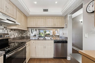 Palma Del Mar, is a waterfront complex located within Isla Del on Isla Del Sol Yacht and Country Club in Florida - for sale on GolfHomes.com, golf home, golf lot