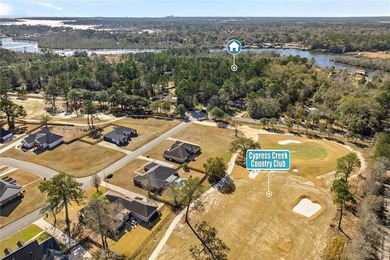This exceptional waterfront home features 4 bedrooms and 4 on Cypress Country Club and Golf Club  in Alabama - for sale on GolfHomes.com, golf home, golf lot