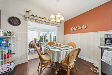 Morning coffee or evening cocktails on the enclosed lanai on Spanish Lakes Fairways in Florida - for sale on GolfHomes.com, golf home, golf lot
