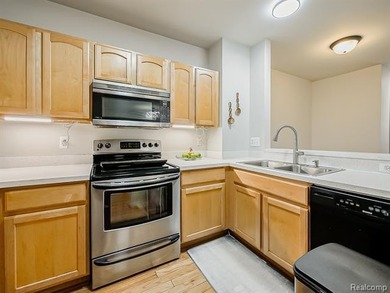 Located in the heart of a convenient and sought-after location on Evergreen Hills Golf Course in Michigan - for sale on GolfHomes.com, golf home, golf lot