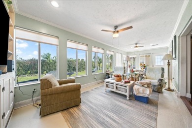 Morning coffee or evening cocktails on the enclosed lanai on Spanish Lakes Fairways in Florida - for sale on GolfHomes.com, golf home, golf lot