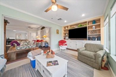 Morning coffee or evening cocktails on the enclosed lanai on Spanish Lakes Fairways in Florida - for sale on GolfHomes.com, golf home, golf lot