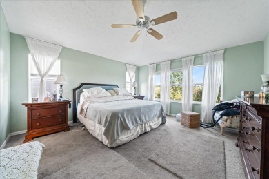 Morning coffee or evening cocktails on the enclosed lanai on Spanish Lakes Fairways in Florida - for sale on GolfHomes.com, golf home, golf lot
