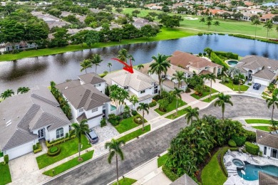 Stunning, two-story 4 BD 4 BA plus office home with lake views on Woodfield Country Club in Florida - for sale on GolfHomes.com, golf home, golf lot