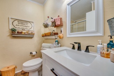 This great two-bed, two-bath home is located on the course at on Pine Lakes Country Club in Florida - for sale on GolfHomes.com, golf home, golf lot