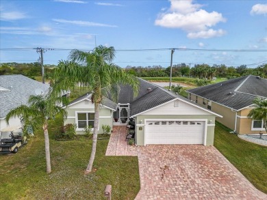 Morning coffee or evening cocktails on the enclosed lanai on Spanish Lakes Fairways in Florida - for sale on GolfHomes.com, golf home, golf lot