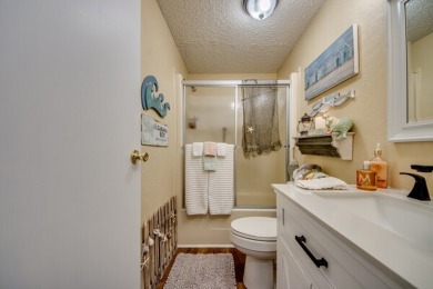 This great two-bed, two-bath home is located on the course at on Pine Lakes Country Club in Florida - for sale on GolfHomes.com, golf home, golf lot