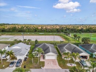 Morning coffee or evening cocktails on the enclosed lanai on Spanish Lakes Fairways in Florida - for sale on GolfHomes.com, golf home, golf lot