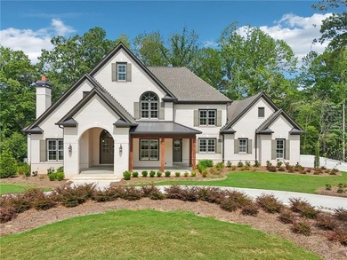 Set on one of the rarest golf-course placements in Governors on The Governors Towne Club in Georgia - for sale on GolfHomes.com, golf home, golf lot
