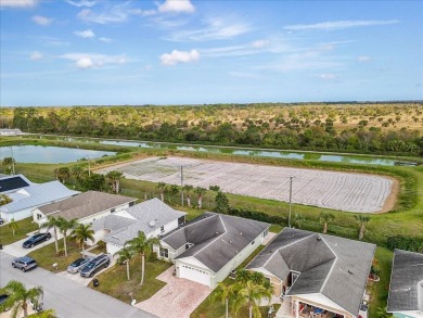 Morning coffee or evening cocktails on the enclosed lanai on Spanish Lakes Fairways in Florida - for sale on GolfHomes.com, golf home, golf lot