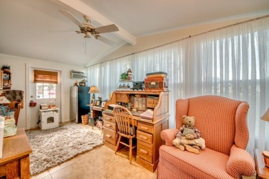 This great two-bed, two-bath home is located on the course at on Pine Lakes Country Club in Florida - for sale on GolfHomes.com, golf home, golf lot