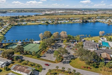 Morning coffee or evening cocktails on the enclosed lanai on Spanish Lakes Fairways in Florida - for sale on GolfHomes.com, golf home, golf lot