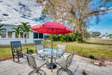 This great two-bed, two-bath home is located on the course at on Pine Lakes Country Club in Florida - for sale on GolfHomes.com, golf home, golf lot