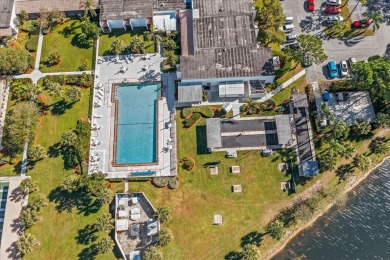 Morning coffee or evening cocktails on the enclosed lanai on Spanish Lakes Fairways in Florida - for sale on GolfHomes.com, golf home, golf lot