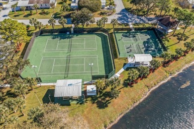 Morning coffee or evening cocktails on the enclosed lanai on Spanish Lakes Fairways in Florida - for sale on GolfHomes.com, golf home, golf lot