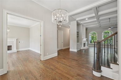 Set on one of the rarest golf-course placements in Governors on The Governors Towne Club in Georgia - for sale on GolfHomes.com, golf home, golf lot