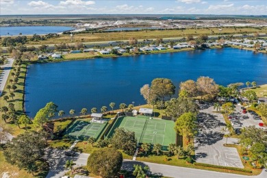 Morning coffee or evening cocktails on the enclosed lanai on Spanish Lakes Fairways in Florida - for sale on GolfHomes.com, golf home, golf lot