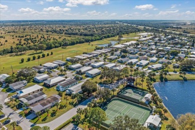 Morning coffee or evening cocktails on the enclosed lanai on Spanish Lakes Fairways in Florida - for sale on GolfHomes.com, golf home, golf lot