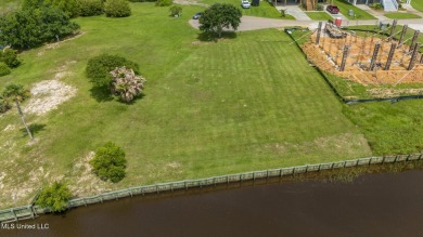 This view speaks for itself..  A stunning waterfront lot with on Diamondhead Country Club in Mississippi - for sale on GolfHomes.com, golf home, golf lot