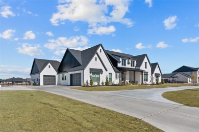 Experience true luxury in this breathtaking executive estate on The Golf Club at Resort Eagle Mountain Lake in Texas - for sale on GolfHomes.com, golf home, golf lot