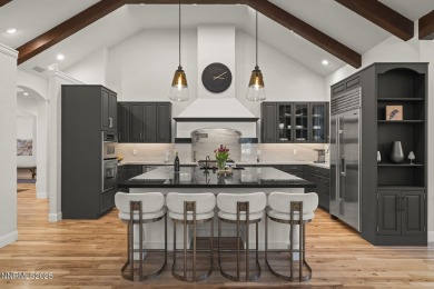 Nestled in the heart of Montreux, this exquisite custom home has on Montreux Golf and Country Club in Nevada - for sale on GolfHomes.com, golf home, golf lot