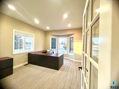 Prime executive office opportunity overlooking the 18th green in on Prairie Green Golf Course in South Dakota - for sale on GolfHomes.com, golf home, golf lot