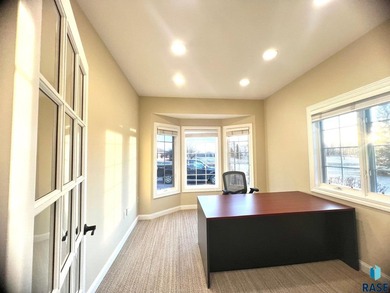 Prime executive office opportunity overlooking the 18th green in on Prairie Green Golf Course in South Dakota - for sale on GolfHomes.com, golf home, golf lot