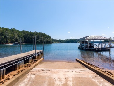 Swim, kayak and beach your boat from your very own waterfront on Keowee Key Golf and Country Club in South Carolina - for sale on GolfHomes.com, golf home, golf lot