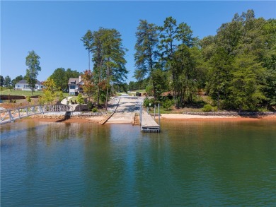 Swim, kayak and beach your boat from your very own waterfront on Keowee Key Golf and Country Club in South Carolina - for sale on GolfHomes.com, golf home, golf lot