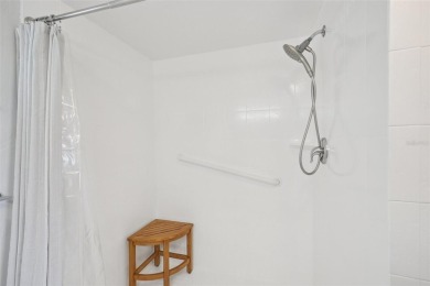 Paradise awaits you with this updated second floor unit on Seven Lakes Golf and Tennis Community in Florida - for sale on GolfHomes.com, golf home, golf lot