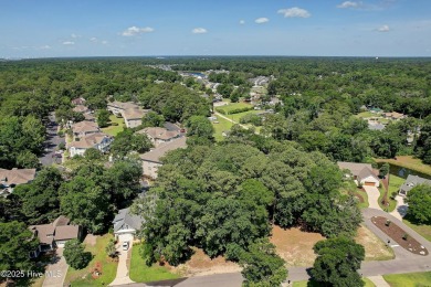 Largest lot available in Oyster Pointe, over half acre.  Great on Oyster Bay Golf Links in North Carolina - for sale on GolfHomes.com, golf home, golf lot