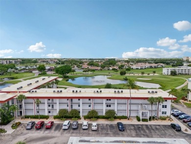 Paradise awaits you with this updated second floor unit on Seven Lakes Golf and Tennis Community in Florida - for sale on GolfHomes.com, golf home, golf lot