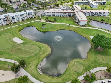 Paradise awaits you with this updated second floor unit on Seven Lakes Golf and Tennis Community in Florida - for sale on GolfHomes.com, golf home, golf lot