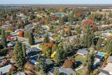 Nestled in the sought-after San Joaquin Country Club Estates on San Joaquin Country Club in California - for sale on GolfHomes.com, golf home, golf lot