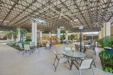 Paradise awaits you with this updated second floor unit on Seven Lakes Golf and Tennis Community in Florida - for sale on GolfHomes.com, golf home, golf lot