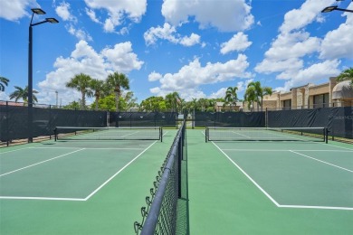 Paradise awaits you with this updated second floor unit on Seven Lakes Golf and Tennis Community in Florida - for sale on GolfHomes.com, golf home, golf lot