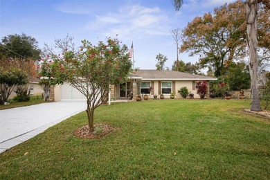 This home is located on the 5th hole of Pine Lakes Golf Course on The Grand Club - Pine Lakes Course in Florida - for sale on GolfHomes.com, golf home, golf lot