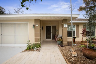 This home is located on the 5th hole of Pine Lakes Golf Course on The Grand Club - Pine Lakes Course in Florida - for sale on GolfHomes.com, golf home, golf lot