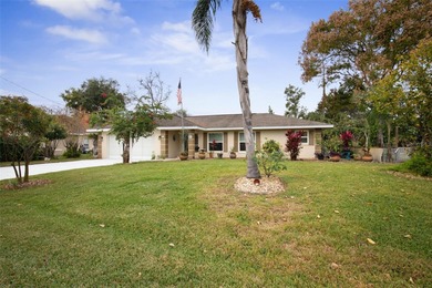 This home is located on the 5th hole of Pine Lakes Golf Course on The Grand Club - Pine Lakes Course in Florida - for sale on GolfHomes.com, golf home, golf lot