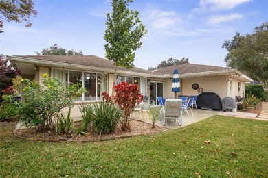 This home is located on the 5th hole of Pine Lakes Golf Course on The Grand Club - Pine Lakes Course in Florida - for sale on GolfHomes.com, golf home, golf lot