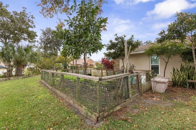 This home is located on the 5th hole of Pine Lakes Golf Course on The Grand Club - Pine Lakes Course in Florida - for sale on GolfHomes.com, golf home, golf lot