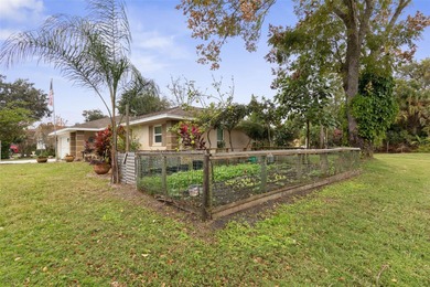 This home is located on the 5th hole of Pine Lakes Golf Course on The Grand Club - Pine Lakes Course in Florida - for sale on GolfHomes.com, golf home, golf lot