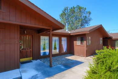 Take a look at this charming home located in the Yosemite Lakes on Yosemite Lakes Park Golf Course in California - for sale on GolfHomes.com, golf home, golf lot