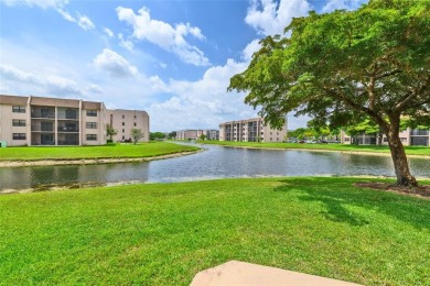 Explore this delightful first-floor unit, boasting two bedrooms on Sunrise Lakes Phase IV Golf Course in Florida - for sale on GolfHomes.com, golf home, golf lot