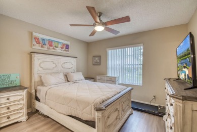 Discover this stunning 3-bedroom, 2-bathroom single-story home on PGA National Golf Club in Florida - for sale on GolfHomes.com, golf home, golf lot