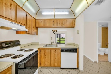 Explore this delightful first-floor unit, boasting two bedrooms on Sunrise Lakes Phase IV Golf Course in Florida - for sale on GolfHomes.com, golf home, golf lot