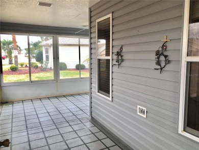 Welcome to this charming 3 bedrooms, 2 bath home in the Villages on Glenview Championship Golf and Country Club in Florida - for sale on GolfHomes.com, golf home, golf lot
